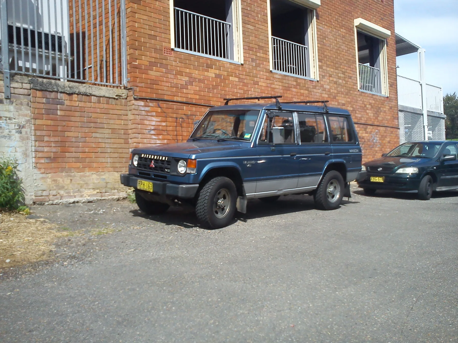 Reference photograph of a classic five-door Mitsubishi Pajero; not Abdullah’s actual vehicle