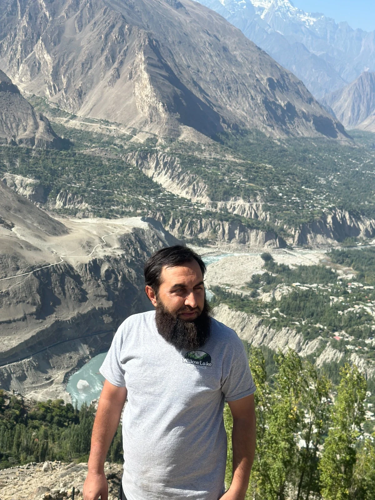 Abdullah looking across a mountain valley